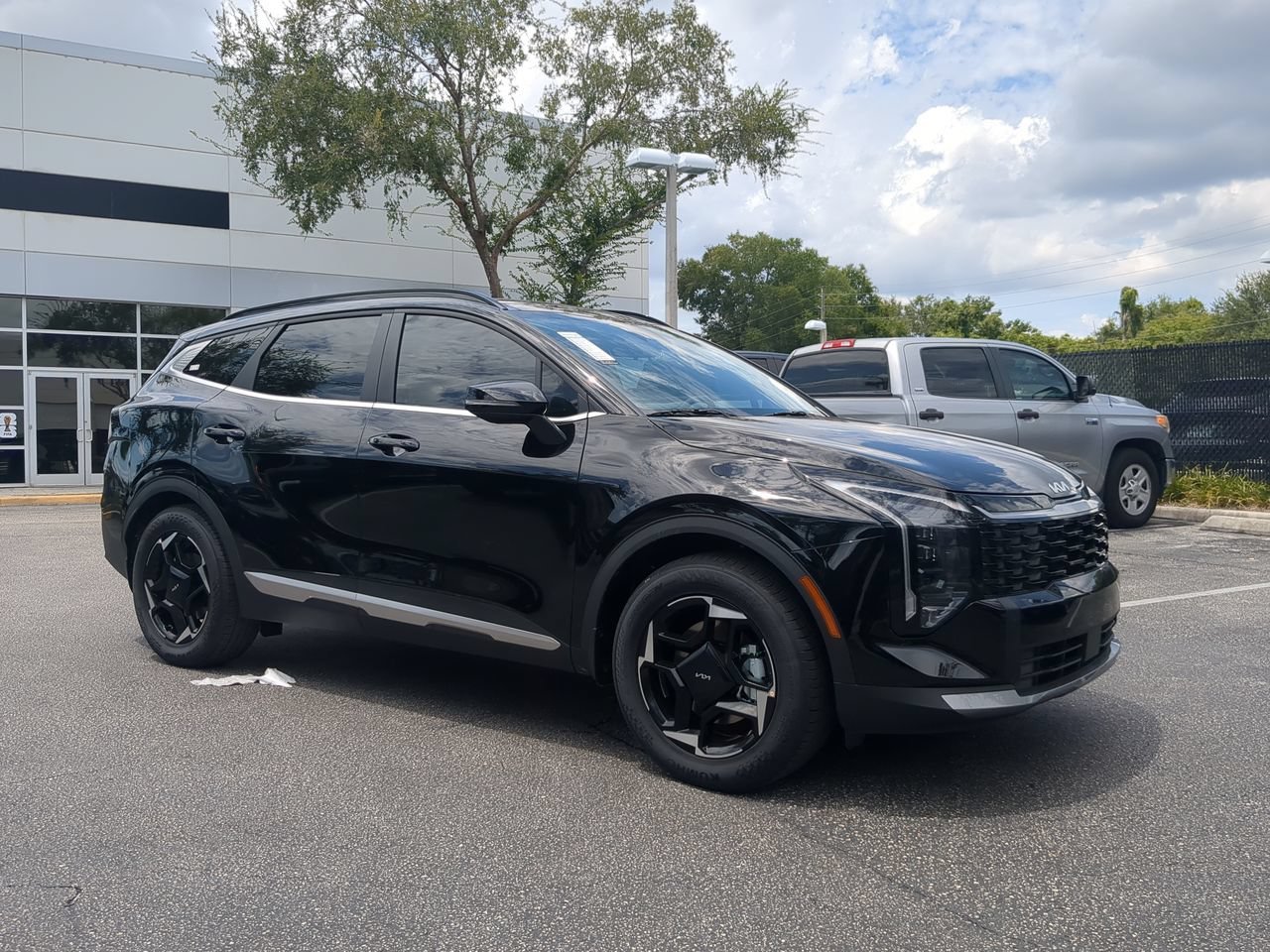 New 2026 Ebony Black Kia EX image 1