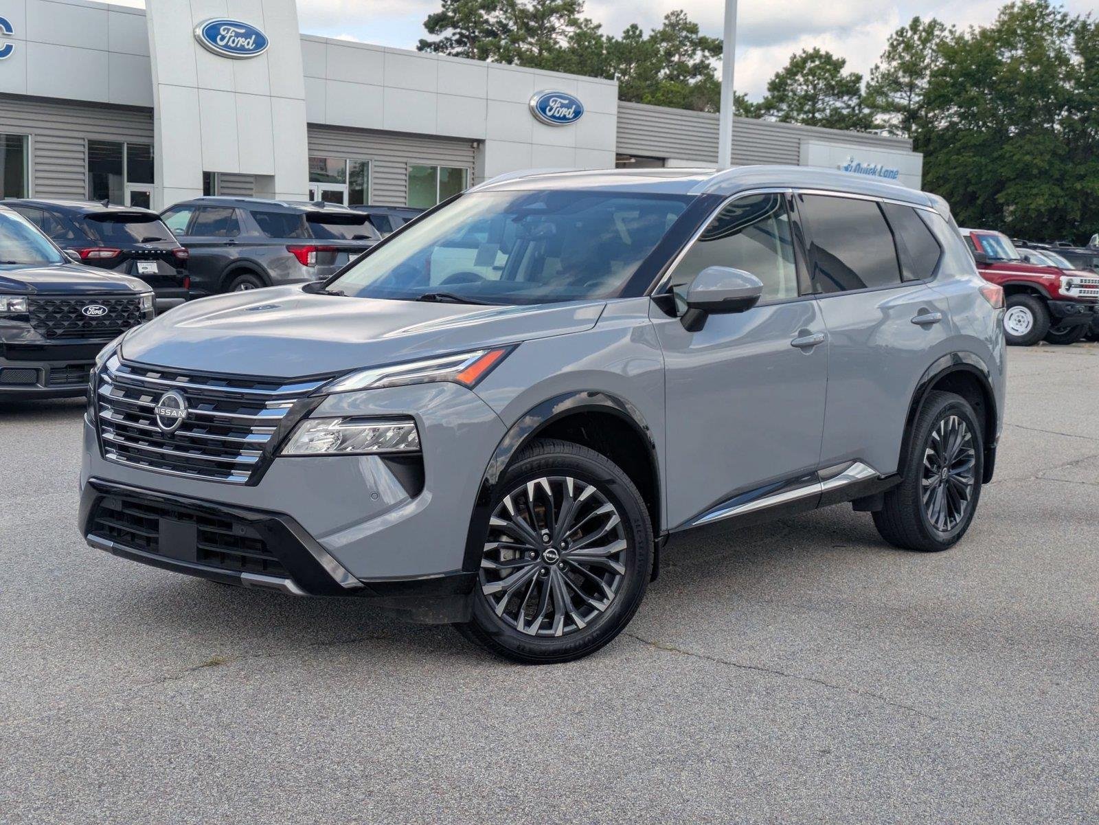 Used 2024 Boulder Gray Pearl Nissan Platinum image 1