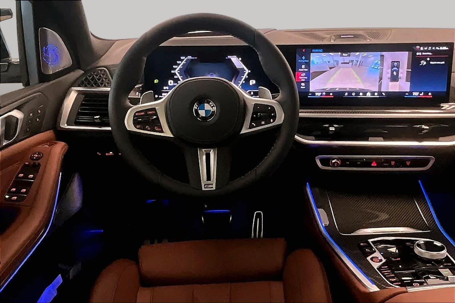 Used 2026 Black Sapphire Metallic BMW M60i image 5