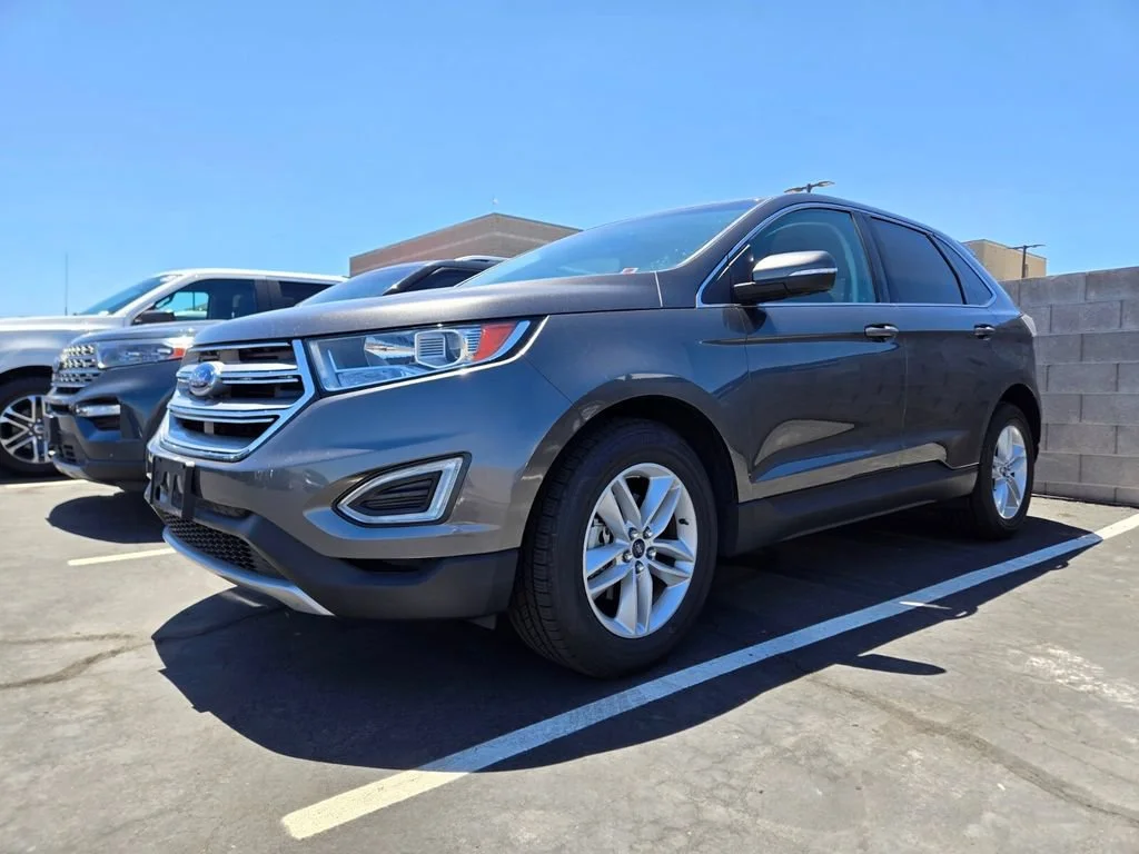Used 2018 Magnetic Metallic Ford SEL image 2
