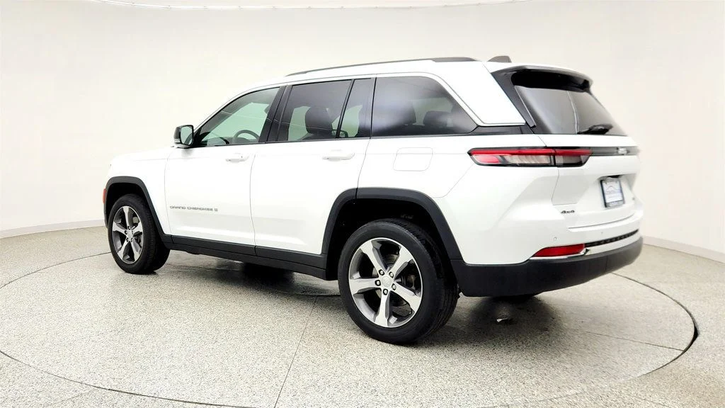 Used 2023 Bright White Clearcoat Jeep Limited 4x4 w/ 20