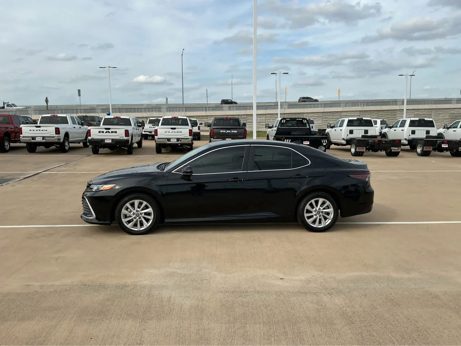 Used 2023 Midnight Black Metallic Toyota LE image 10