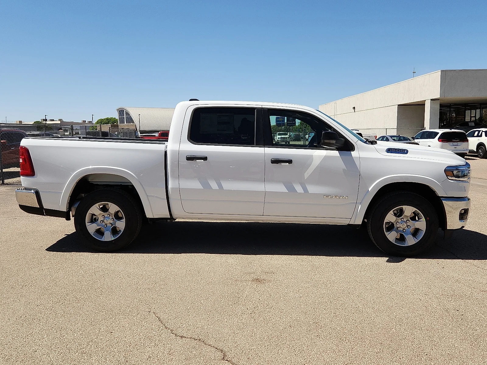New 2026 Bright White Clear-Coat  Paint Ram LONE STAR CREW CAB 4X2 5