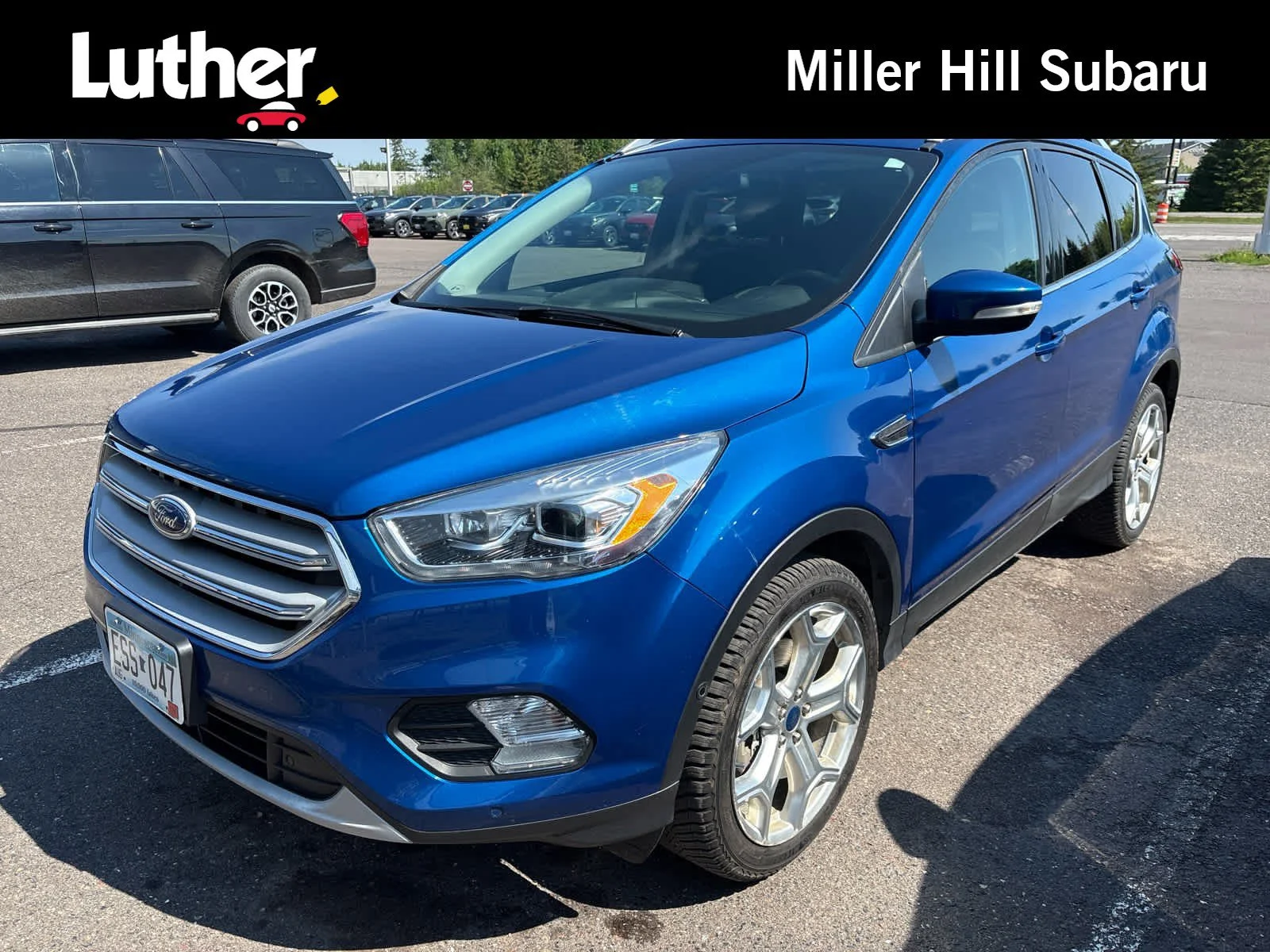 Used 2019 Lightning Blue Metallic Ford Titanium image 1