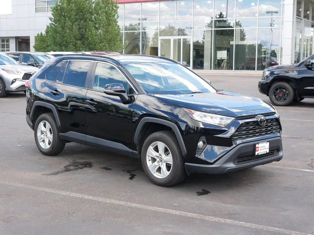 Certified 2021 Toyota RAV4 XLE with VIN 2T3P1RFV3MW155324 for sale in Minneapolis, Minnesota