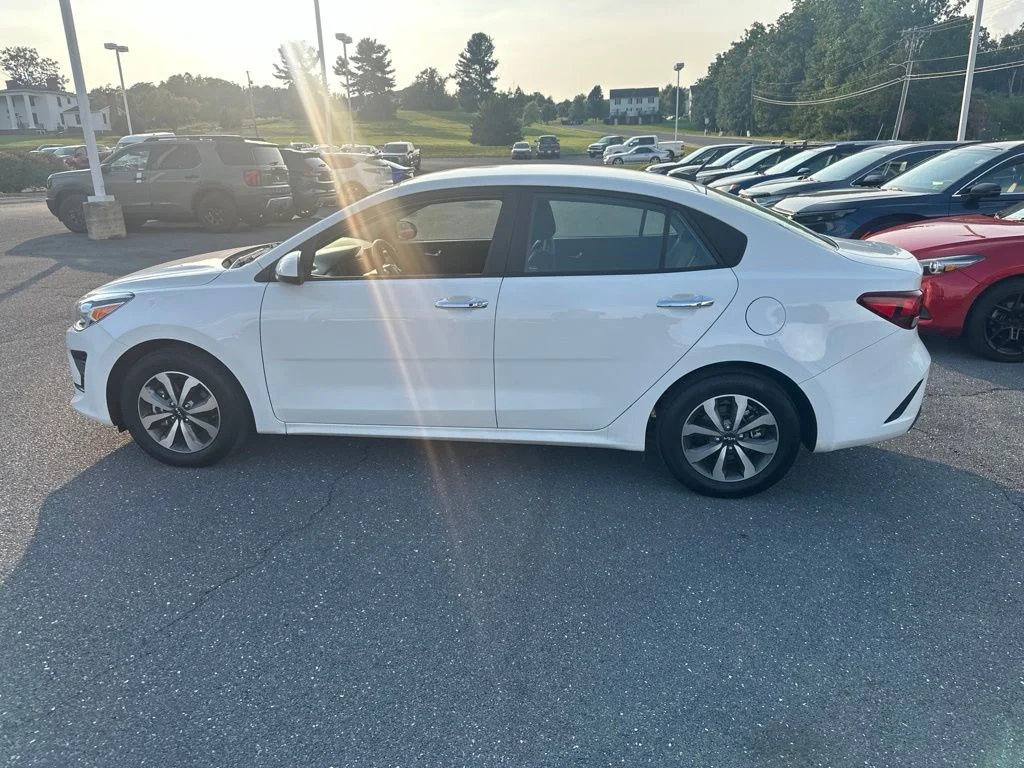 Used 2023 Clear White Kia S image 8