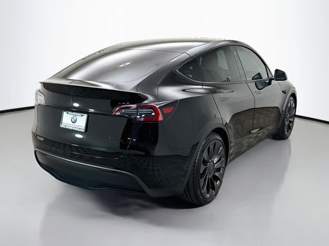 Used 2023 Solid Black Tesla Performance image 7