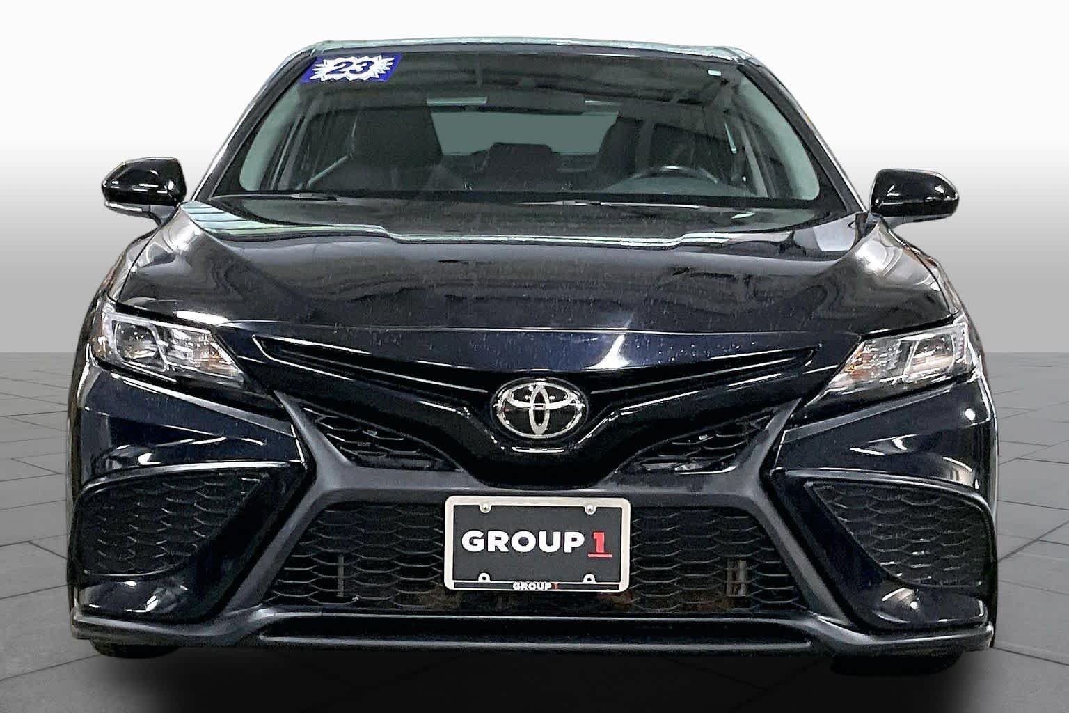 Used 2023 Midnight Black Metallic Toyota SE image 4
