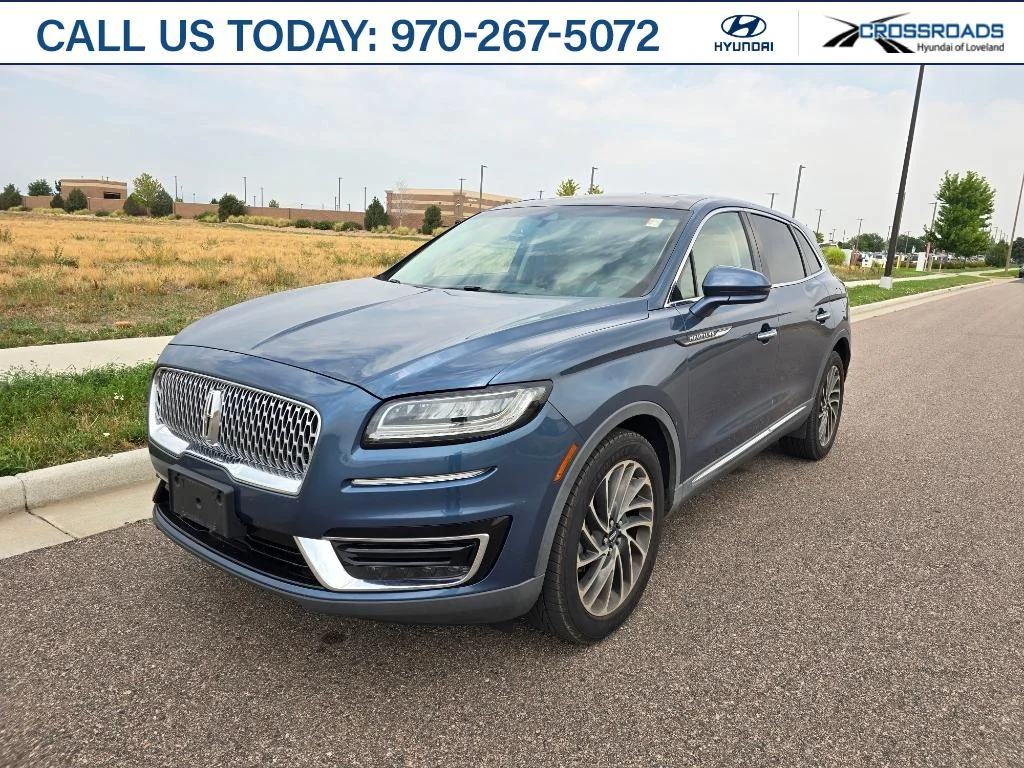 Used 2019 Blue Diamond Metallic Lincoln Reserve image 1