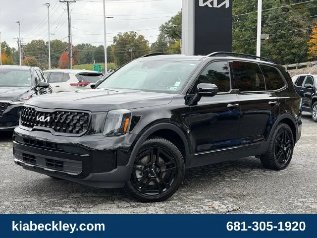 Used 2024 Black Kia EX X-Line image 2