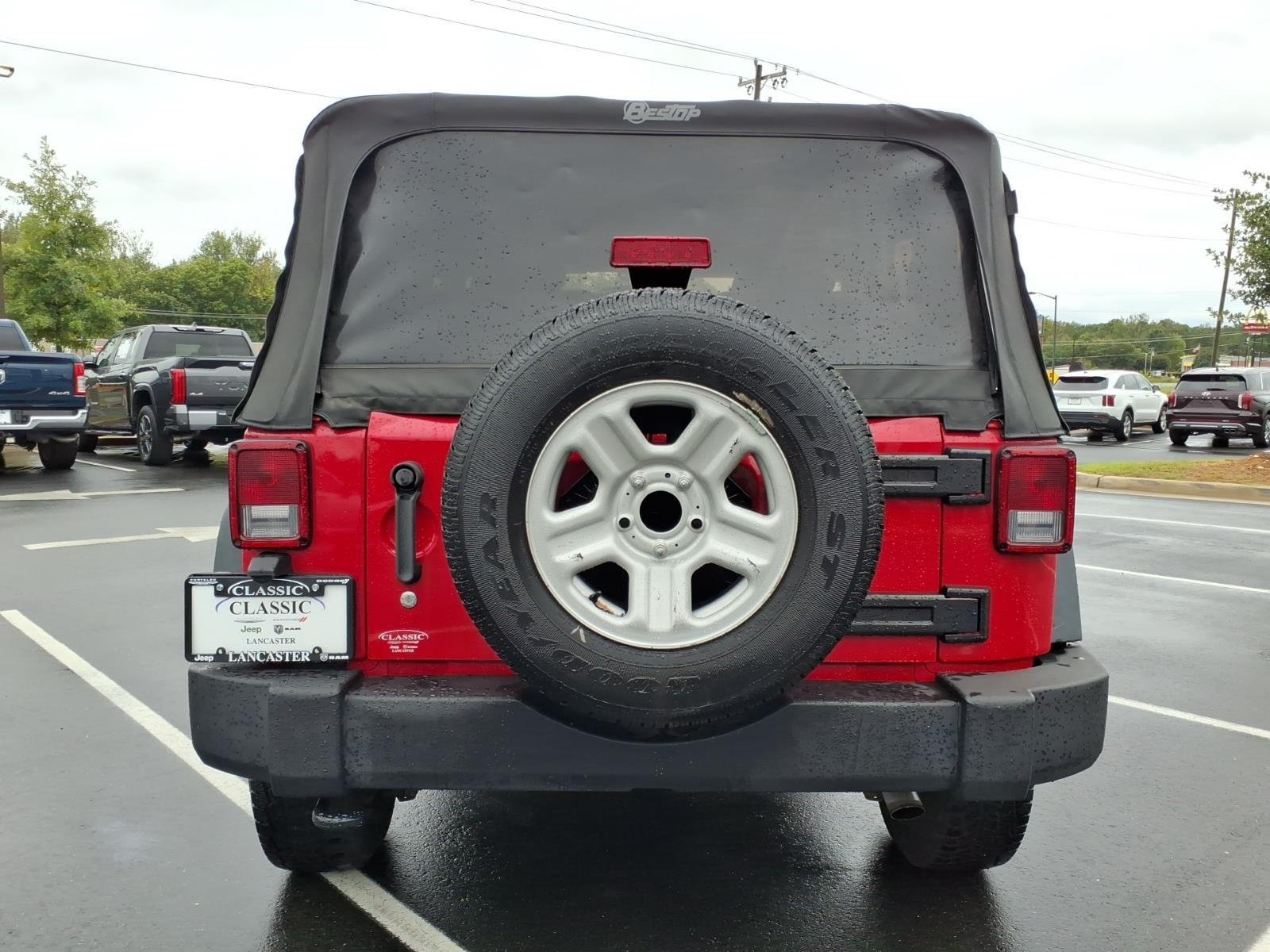 Used 2013 Flame Red Clearcoat Jeep Sport image 15
