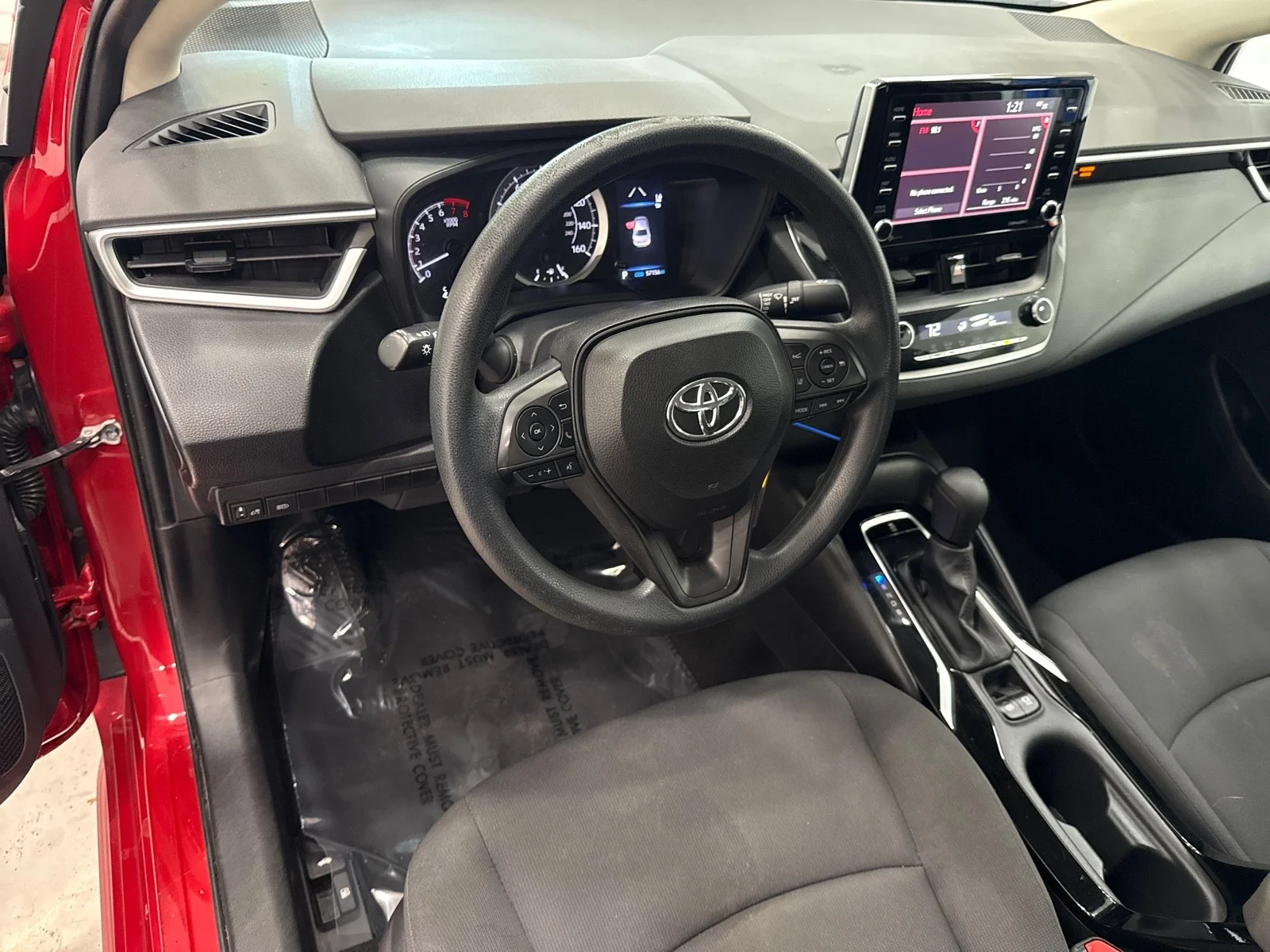 Used 2021 Barcelona Red Metallic Toyota LE image 12