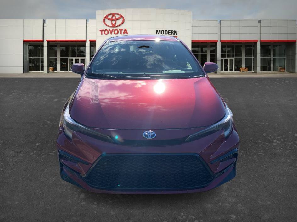 Certified Used 2025 Ruby Flare Pearl Toyota Hybrid SE image 2