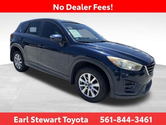 Used 2016 Mazda CX-5 Sport with VIN JM3KE2BY3G0771563 for sale in Lake Park, FL