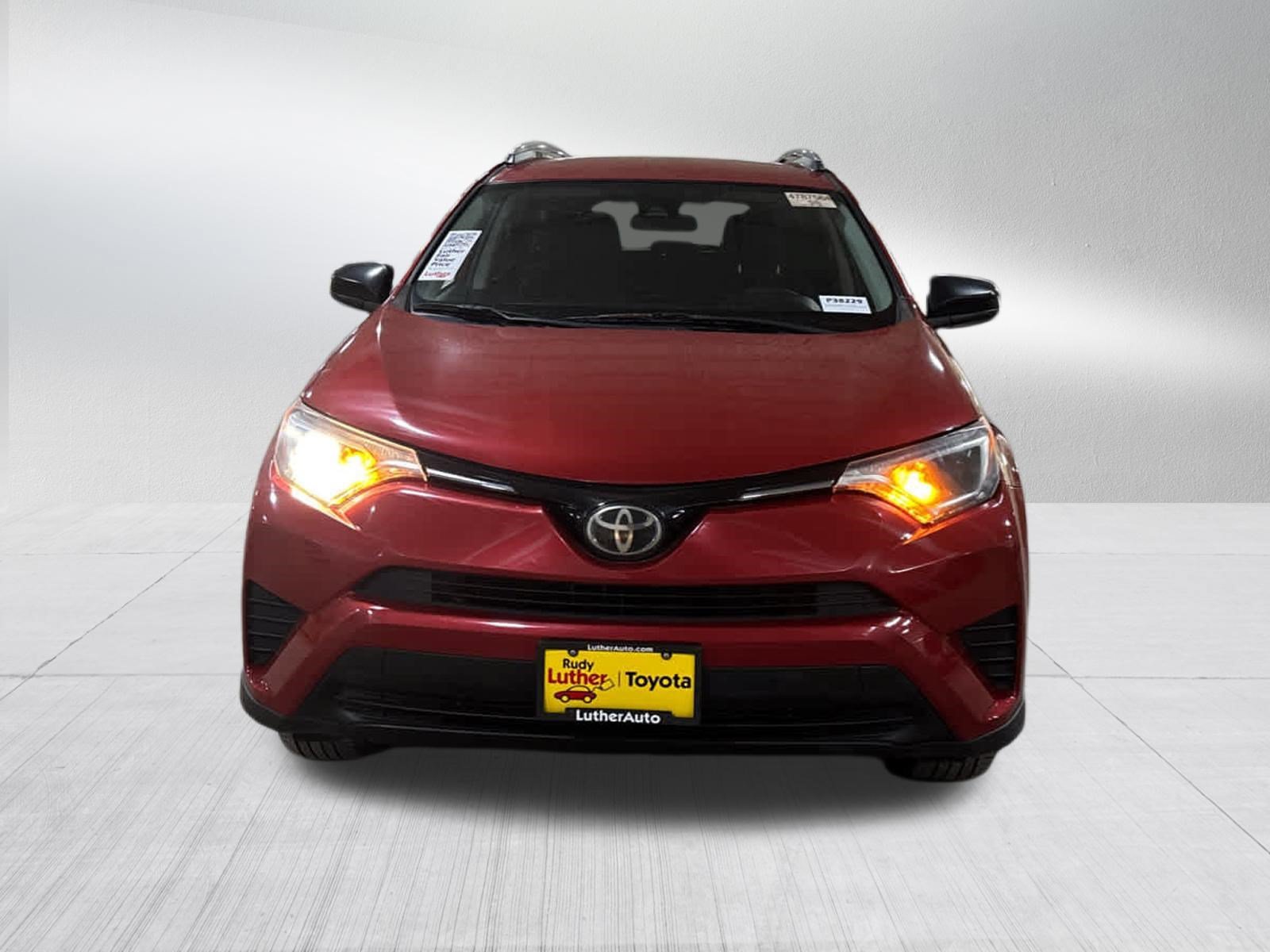 Certified Used 2017 Barcelona Red Metallic Toyota LE image 2