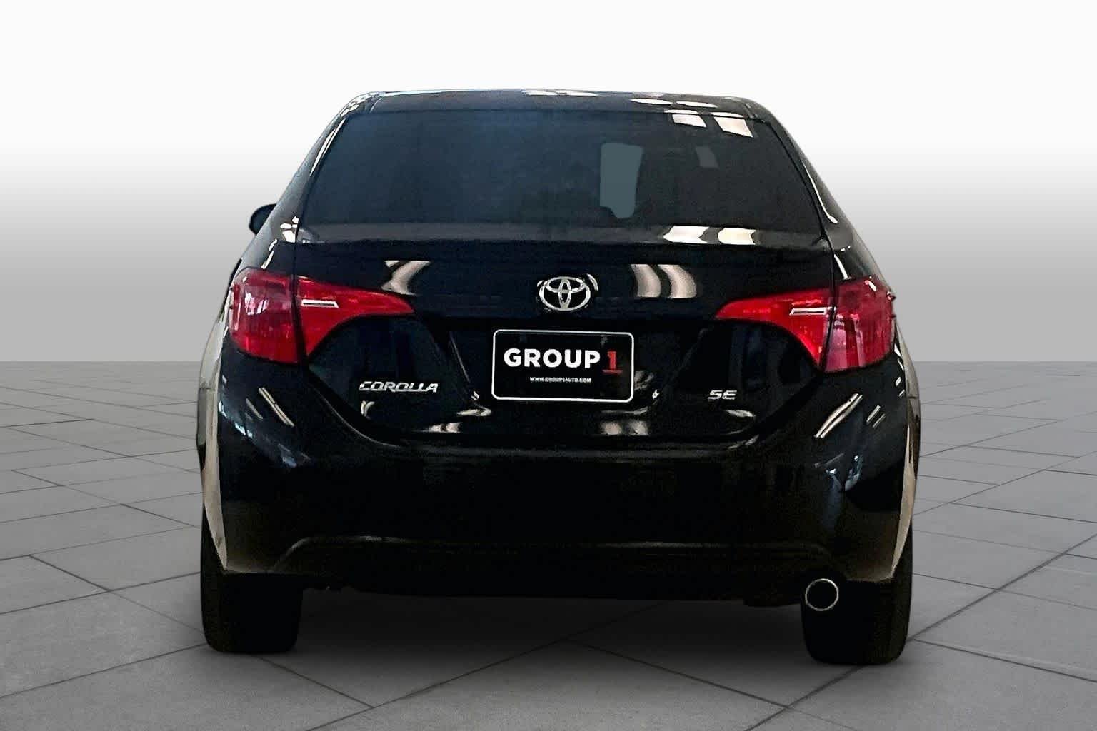 Used 2018 Black Sand Pearl Toyota SE image 4