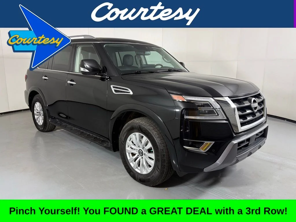 Used 2024 Black Nissan SV image 1