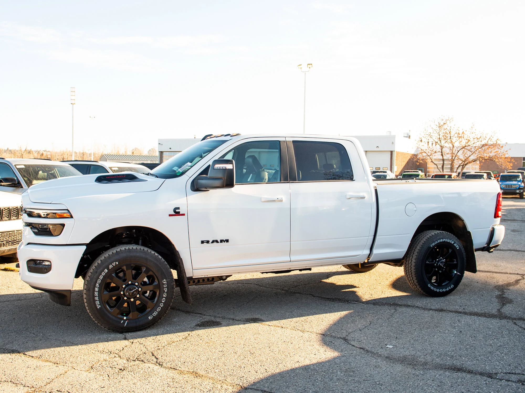 New 2026 White RAM Laramie* image 2