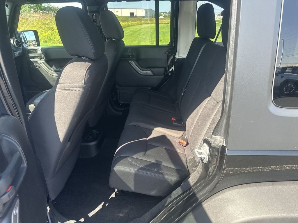 Used 2014 Black Jeep Unlimited Sport image 26