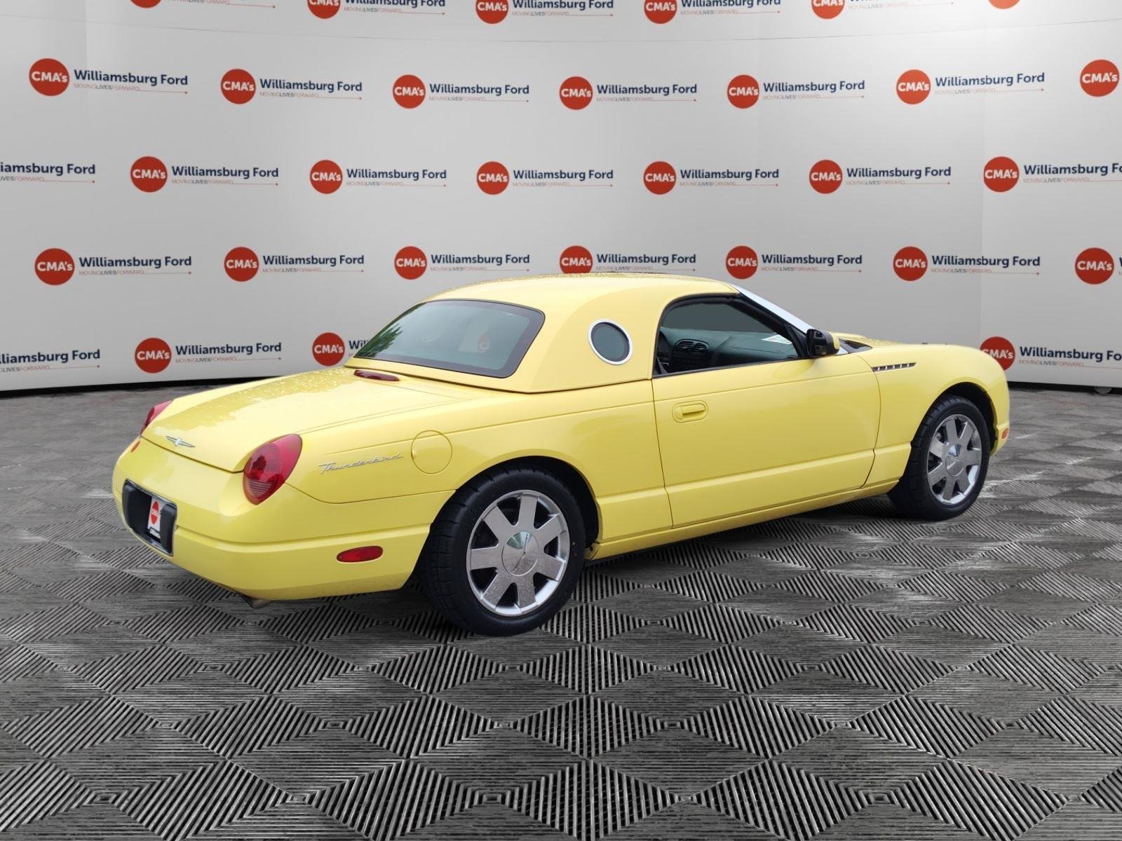 Used 2002 Inspiration Yellow Ford Deluxe image 5