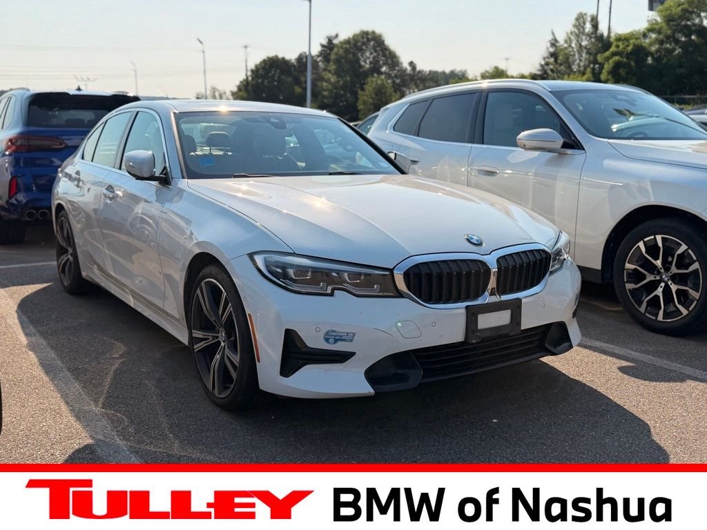 Used 2021 White BMW 330e iPerformance image 1