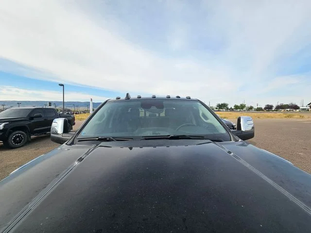 Used 2024 Diamond Black Ram Laramie image 4
