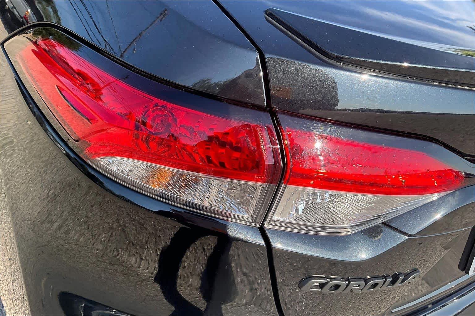 Used 2022 Black Sand Pearl Toyota SE image 28