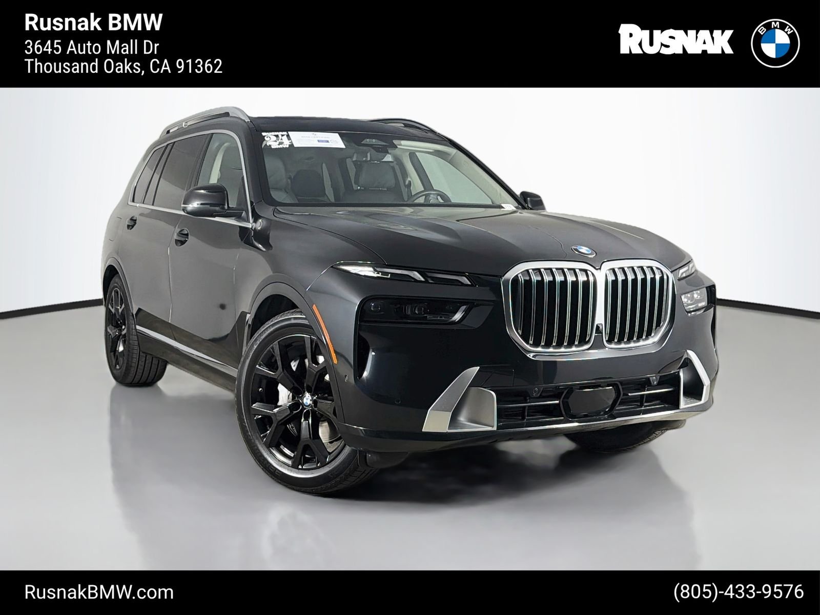 Certified Used 2024 Black Sapphire Metallic BMW xDrive40i image 1