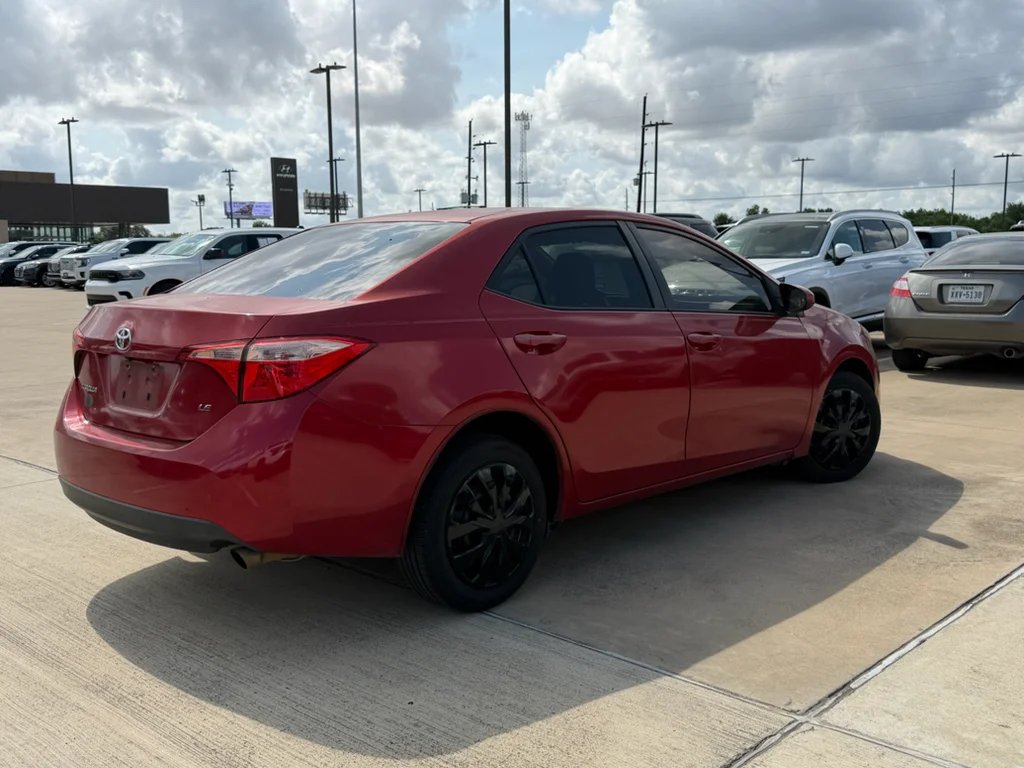 Used 2017 Barcelona Red Metallic Toyota LE image 6