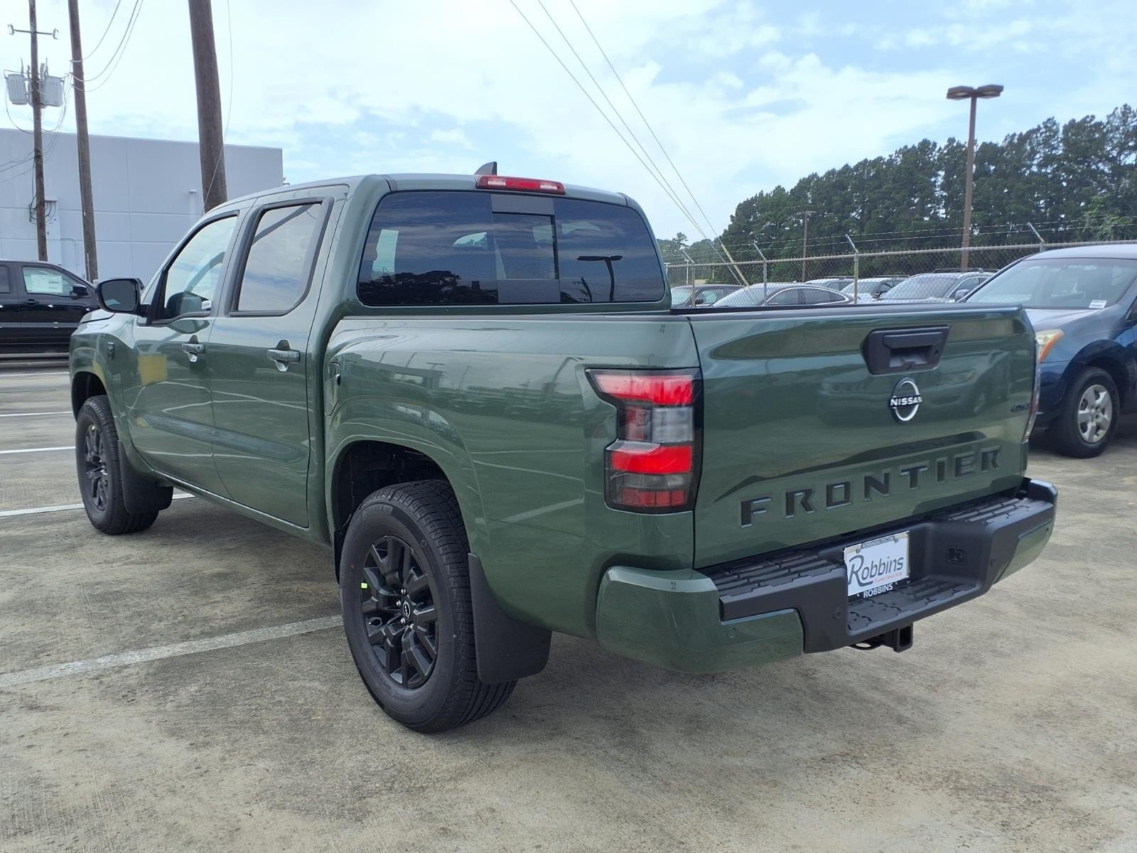 2026 Nissan Frontier SV Green at Robbins Nissan