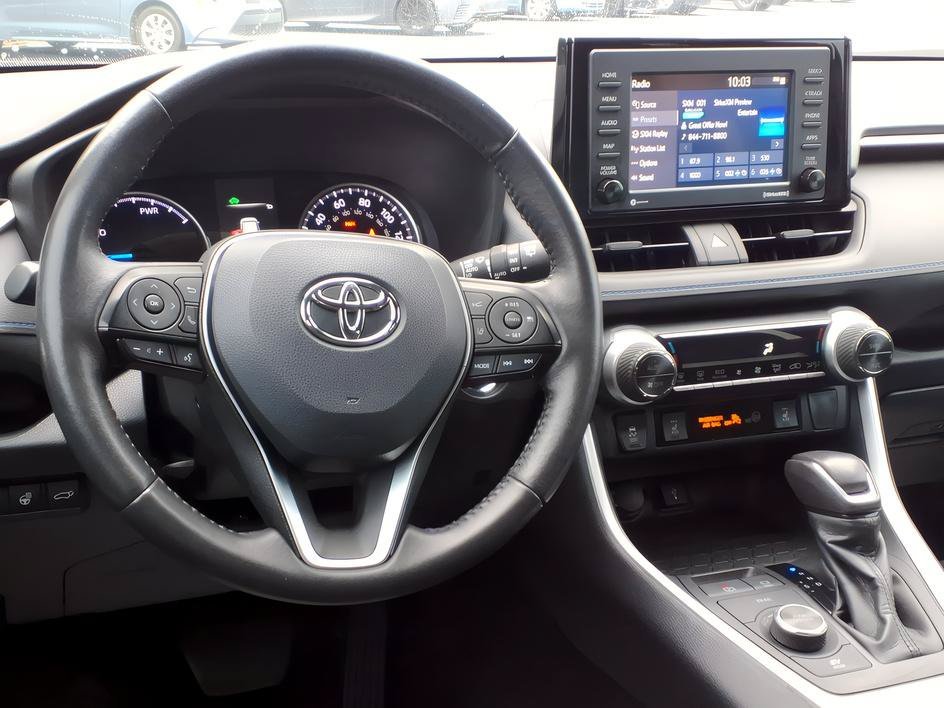 Used 2022 Cavalry Blue Toyota Hybrid SE image 12