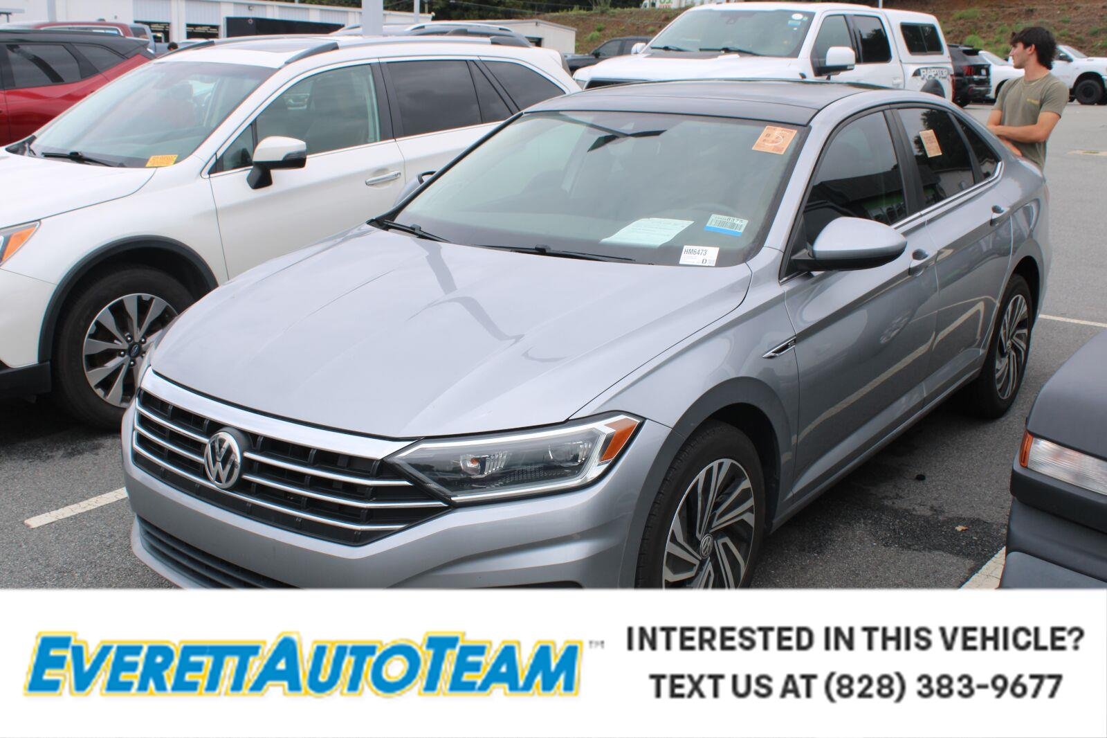 Used 2021 Pyrite Silver Metallic Volkswagen SEL image 1