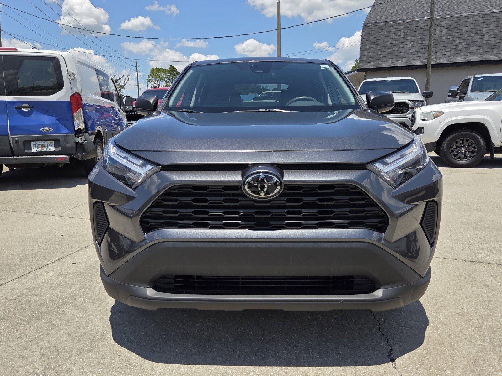 Used 2024 Magnetic Gray Metallic Toyota LE image 1