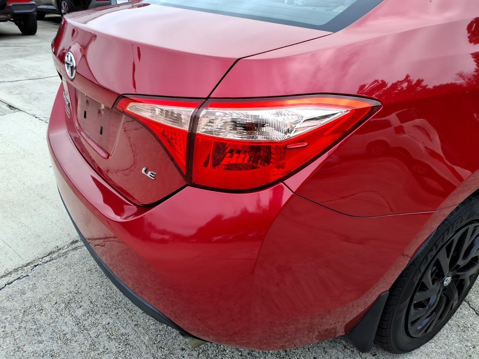 Used 2018 Barcelona Red Metallic Toyota LE image 9