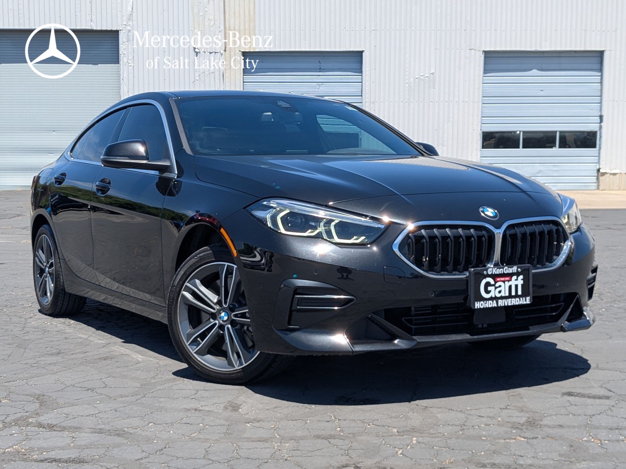 Used 2024 Black Sapphire Metallic BMW 228i image 1