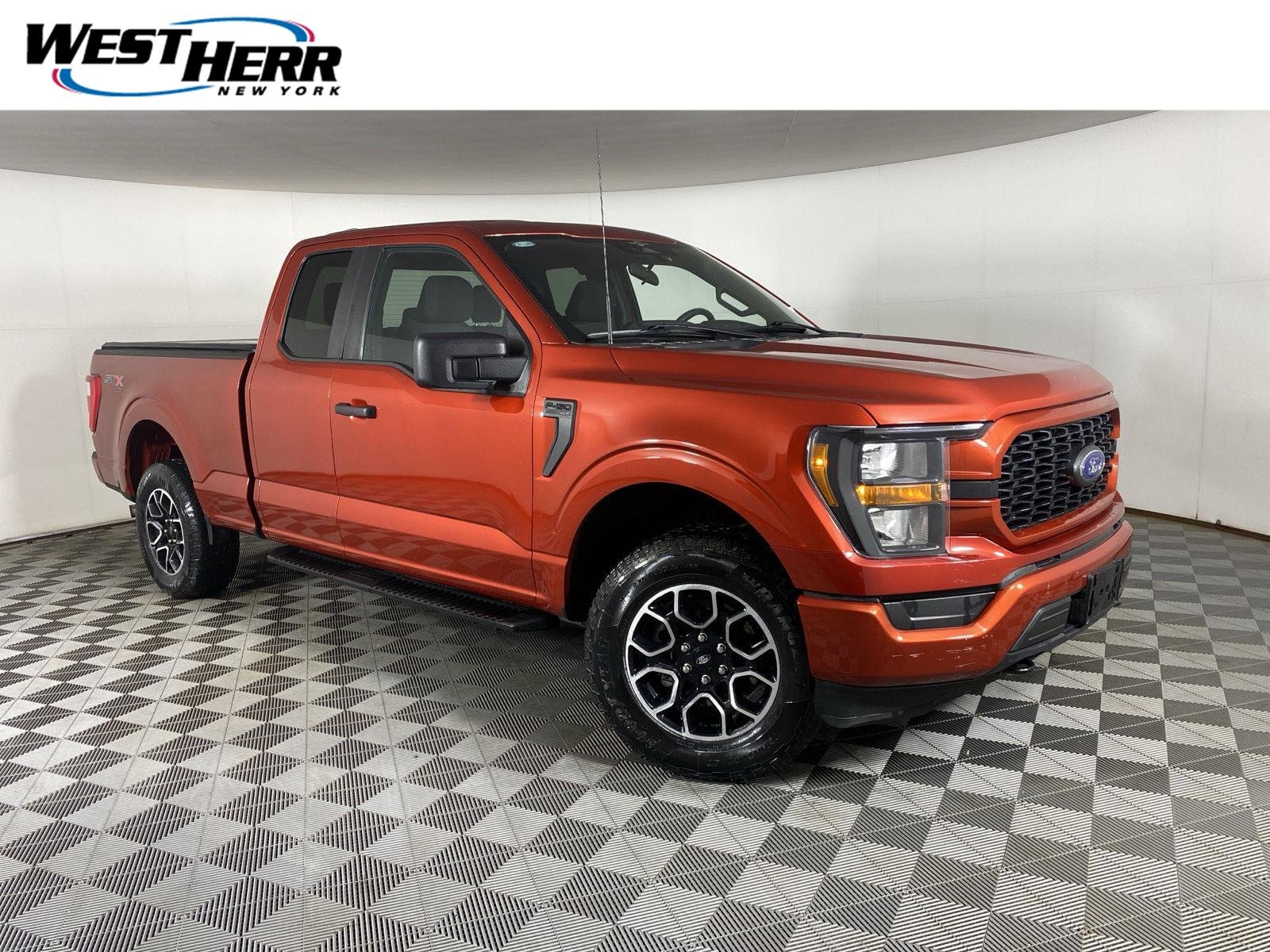 Used 2023 Hot Pepper Red Tinted Clearcoat Ford XL image 1