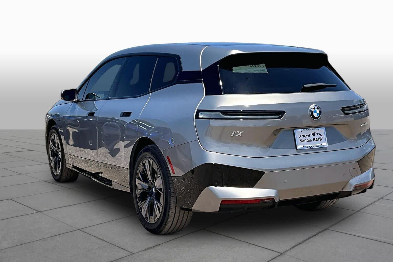 Used 2024 Oxide Grey Metallic BMW xDrive50 image 9