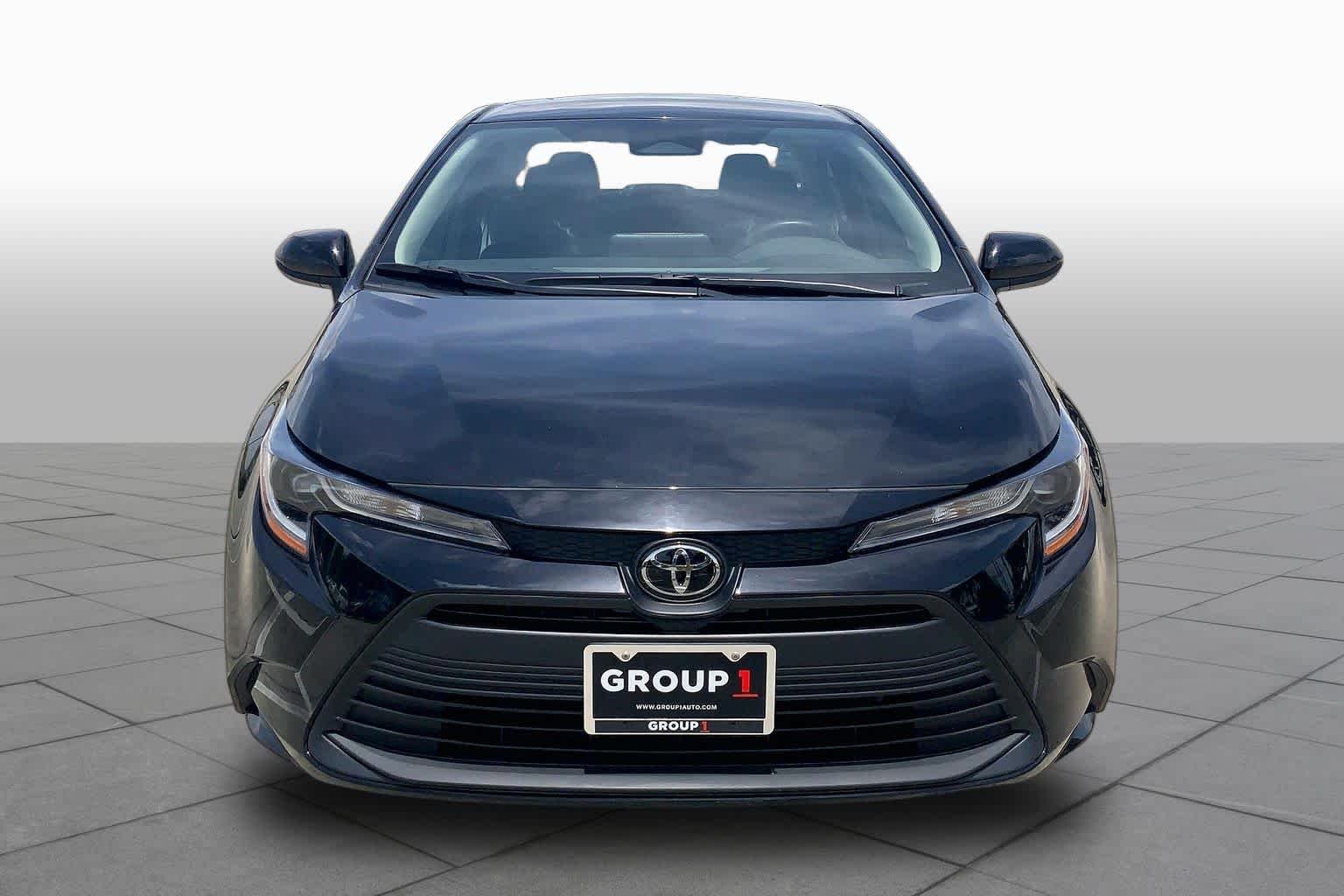 Used 2024 Midnight Black Metallic Toyota LE image 4