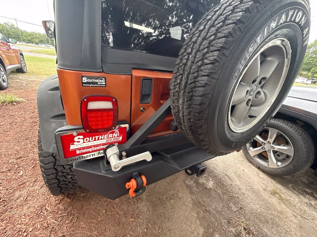 Used 2000 Orange Jeep Sport image 11