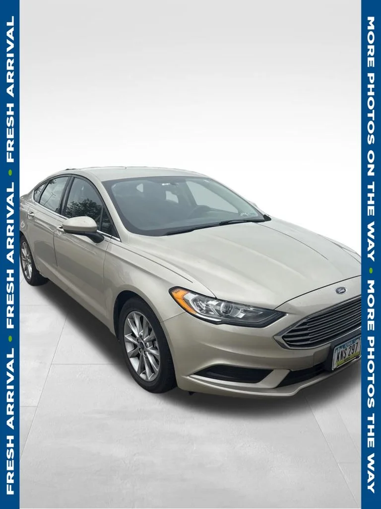 Used 2017 Gold Ford SE image 1