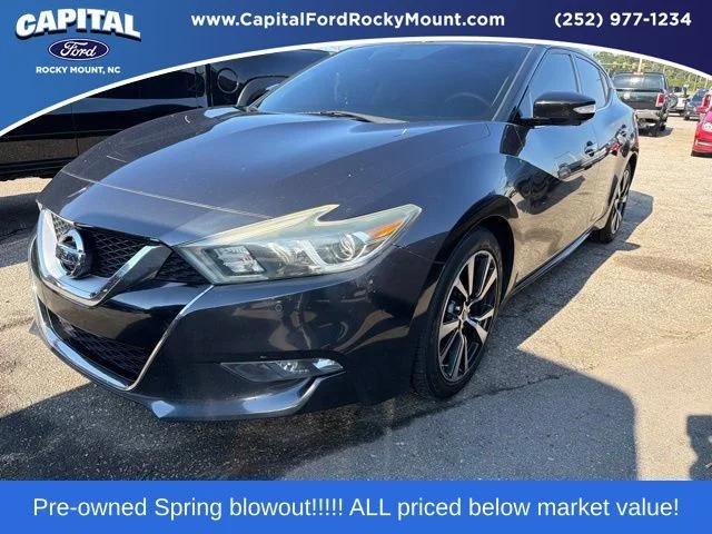 Used 2016 Blue Nissan Platinum image 1