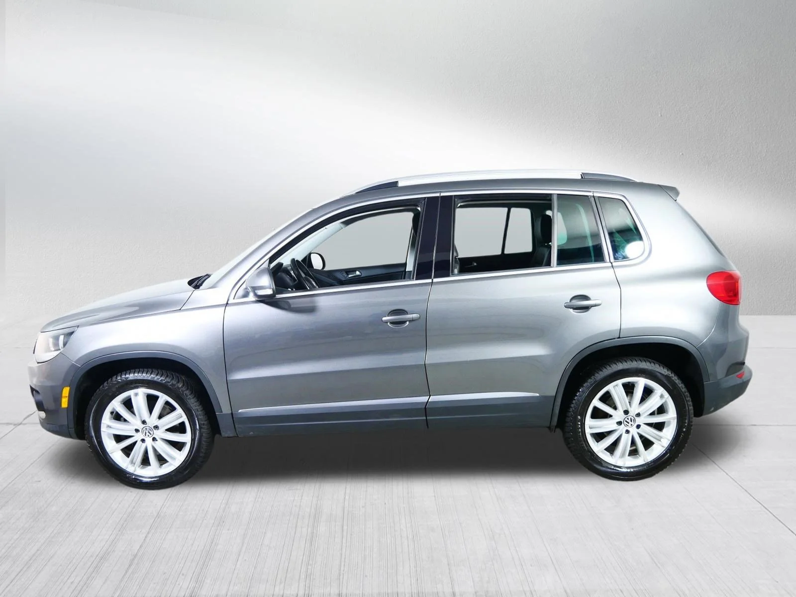 Used 2012 Pepper Gray Metallic Volkswagen S w/Sunroof image 4