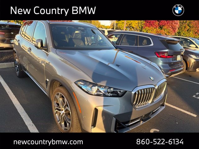 Used 2026 Skyscraper Grey Metallic BMW xDrive40i image 1