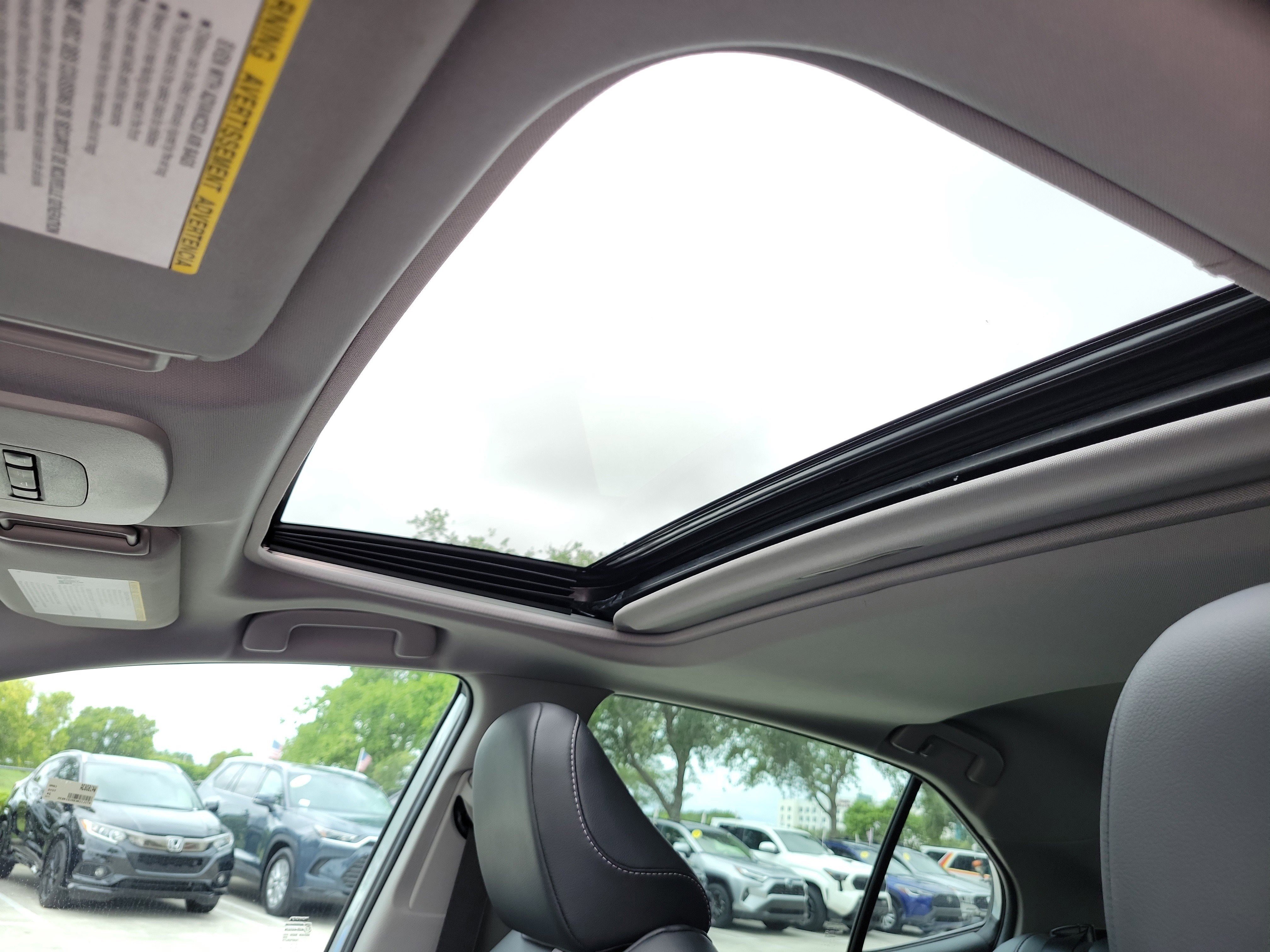 Used 2024 Celestial Silver Metallic Toyota SE image 24