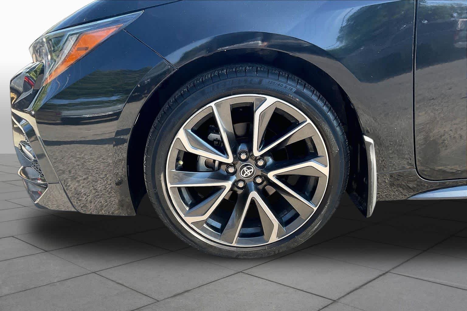 Used 2022 Black Sand Pearl Toyota SE image 11