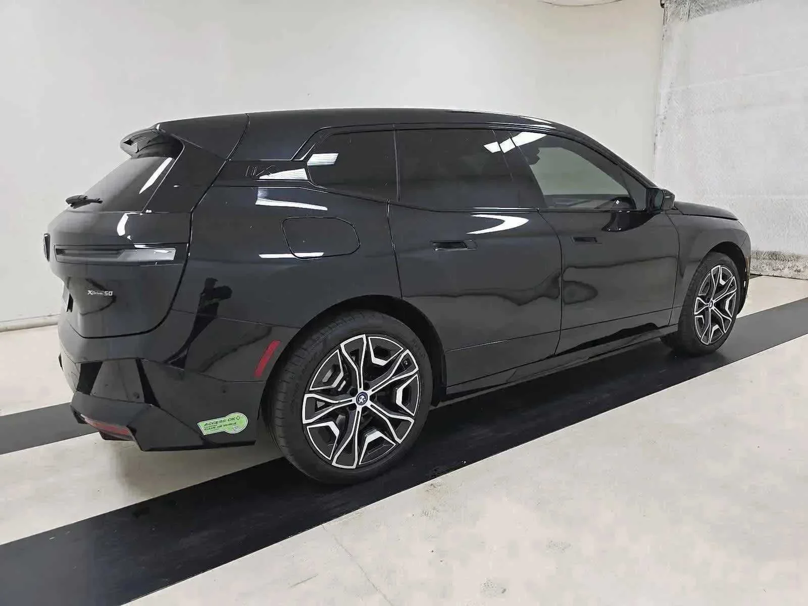 Certified Used 2024 Black Sapphire Metallic BMW xDrive50 image 2