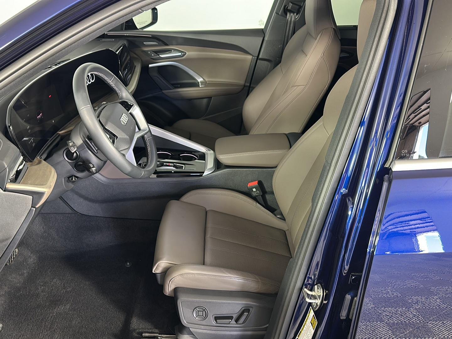 Used 2025 Navarra Blue Metallic Audi Premium Plus image 16