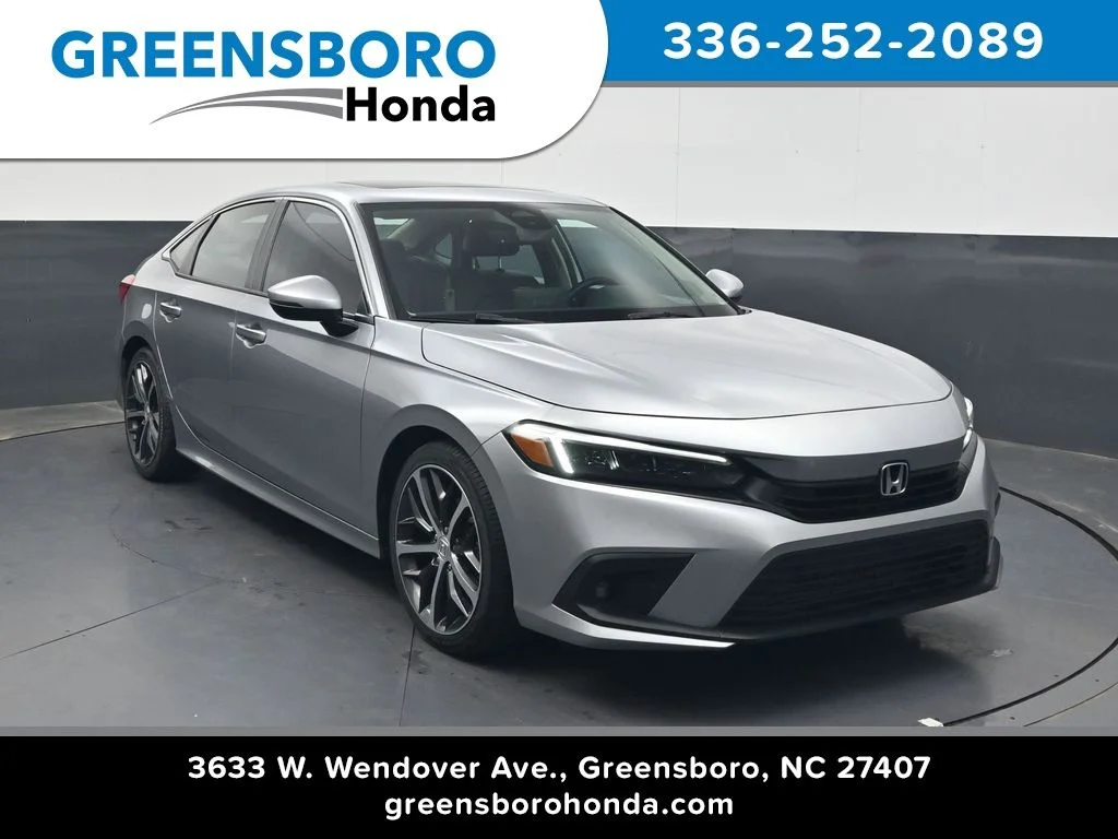 Certified Used 2024 Lunar Silver Metallic Honda Touring image 1