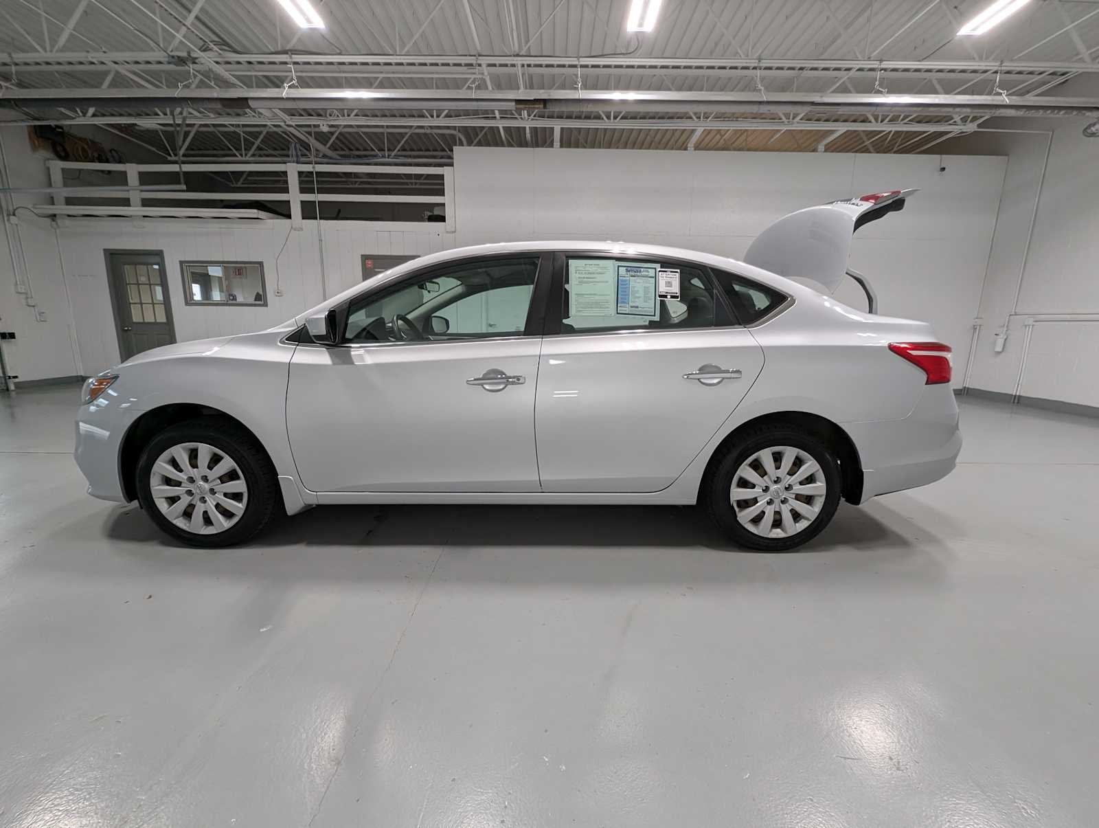 Used 2017 Brilliant Silver Nissan S image 12