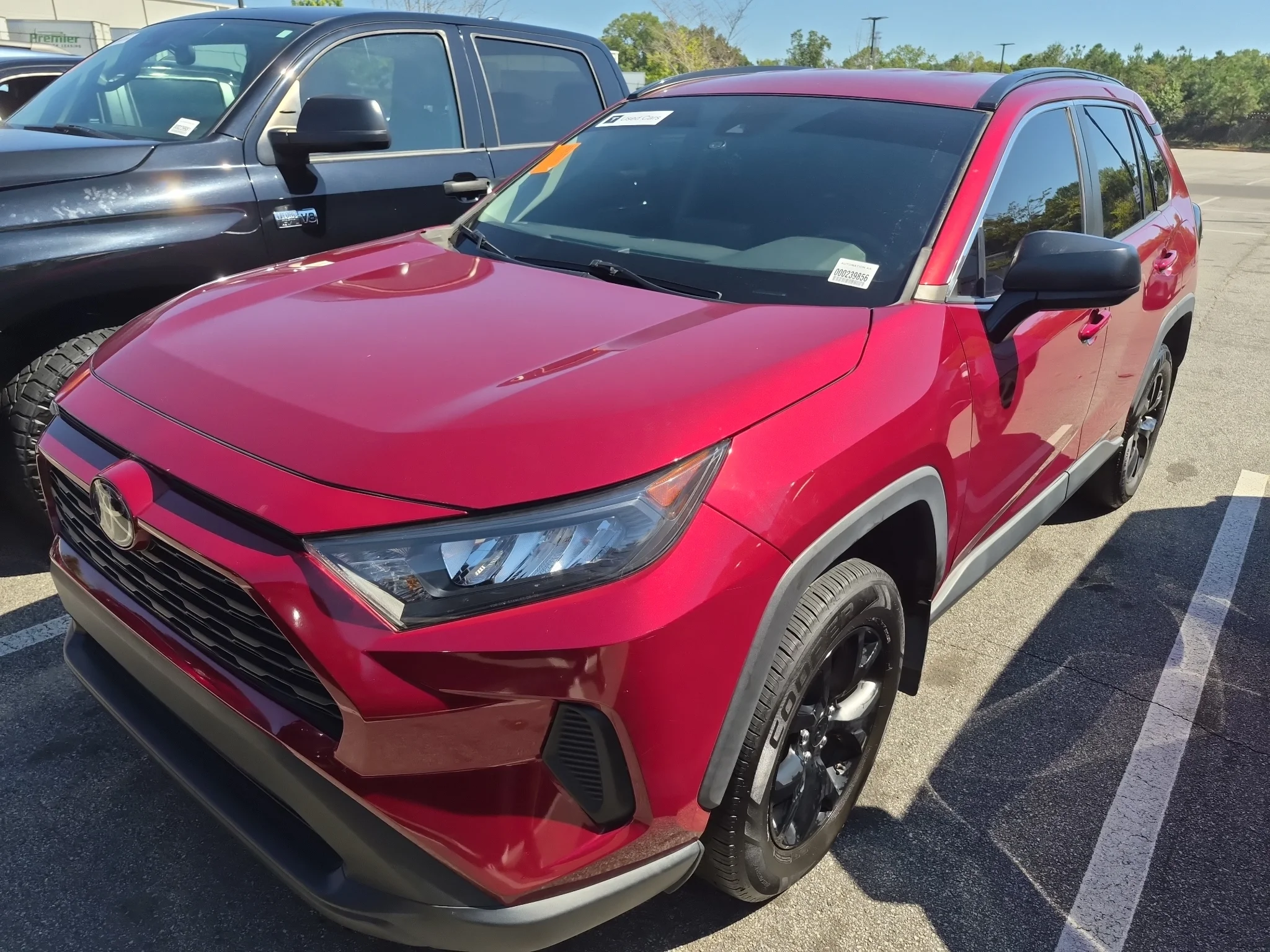 Used 2021 Ruby Flare Pearl Toyota LE image 2